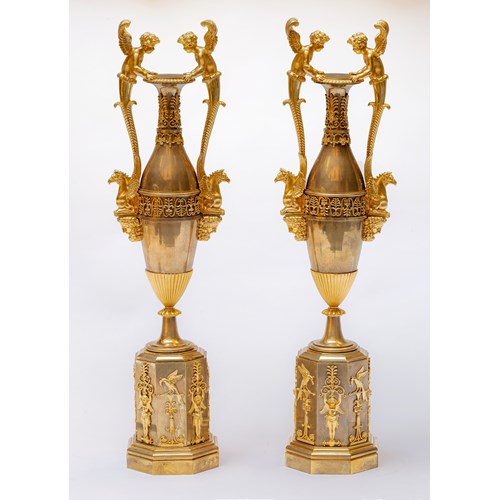 A fine pair of Empire ormolu and patinaed bronze vases "aux amours"